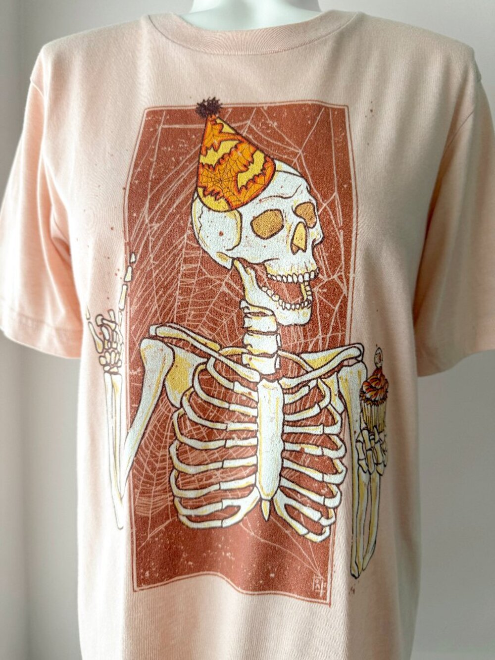 Unisex Spooky Halloween Skeleton Heather Peach T-Shirt (Bella Canvas)